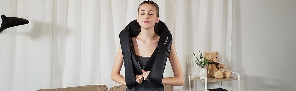 A woman enjoying the iKristin Electric Back & Neck Massager at home. The image highlights its comfortable design and ease of use, perfect for relaxing your neck and shoulders after a long day.